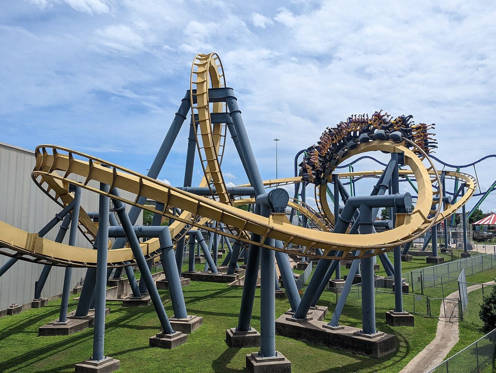 A yellow roller coaster at Six Flags Over Texas
